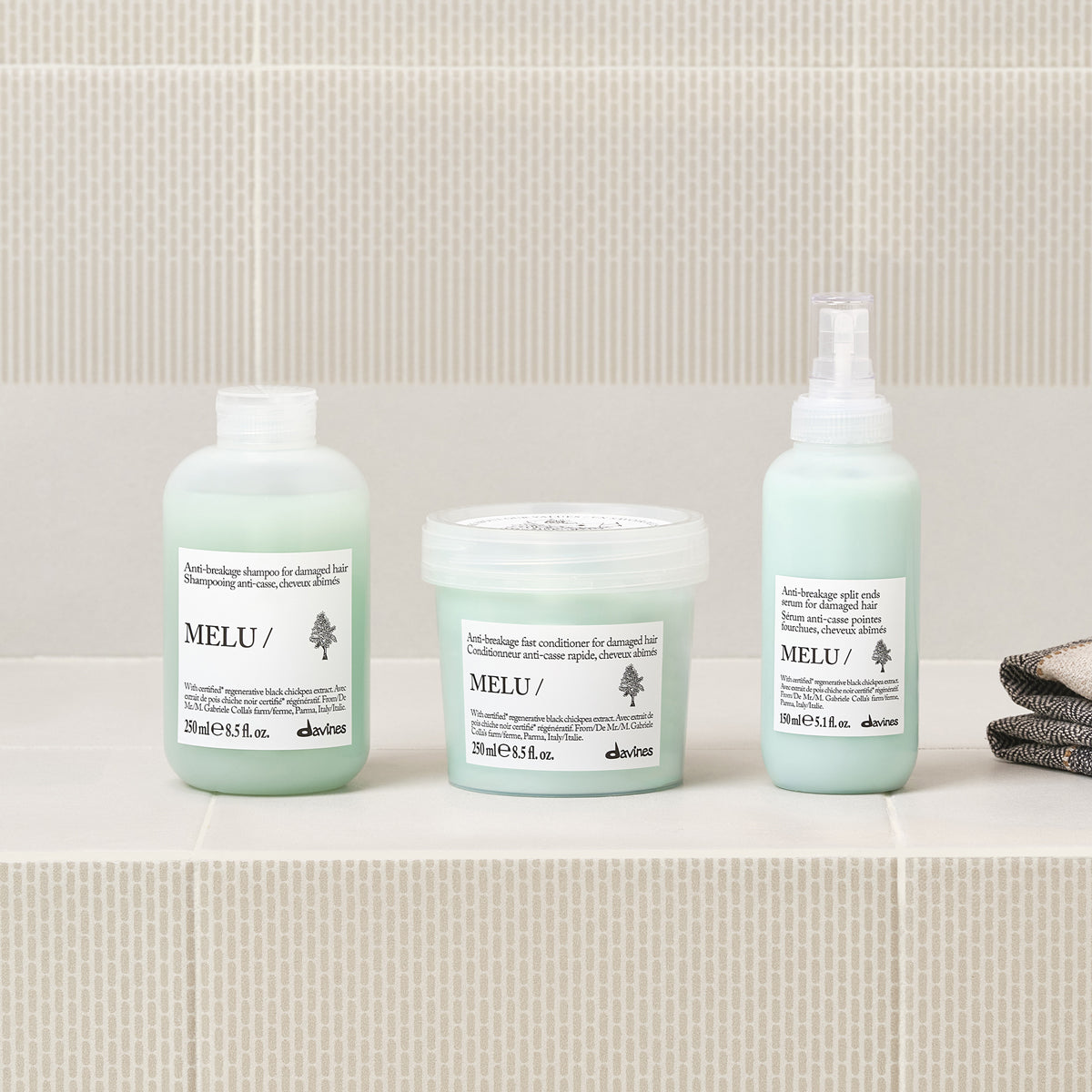 Lifestyle photo of Davines Melu Shampoo for long or damaged hair
