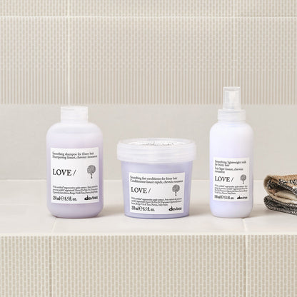 Lifestyle photo of Davines Love Smoothing Lightweight Milk for frizzy hair