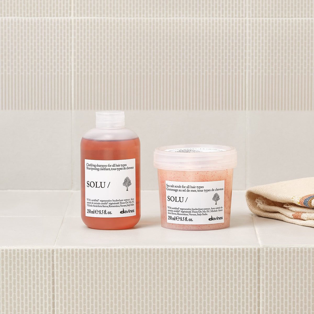 Lifestyle photo of Davines Solu Shampoo, clarifying shampoo for all hair types